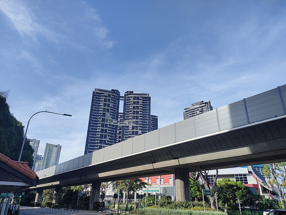 The Trilinq towers beyond the Clementi MRT viaduct, photographed in 2022